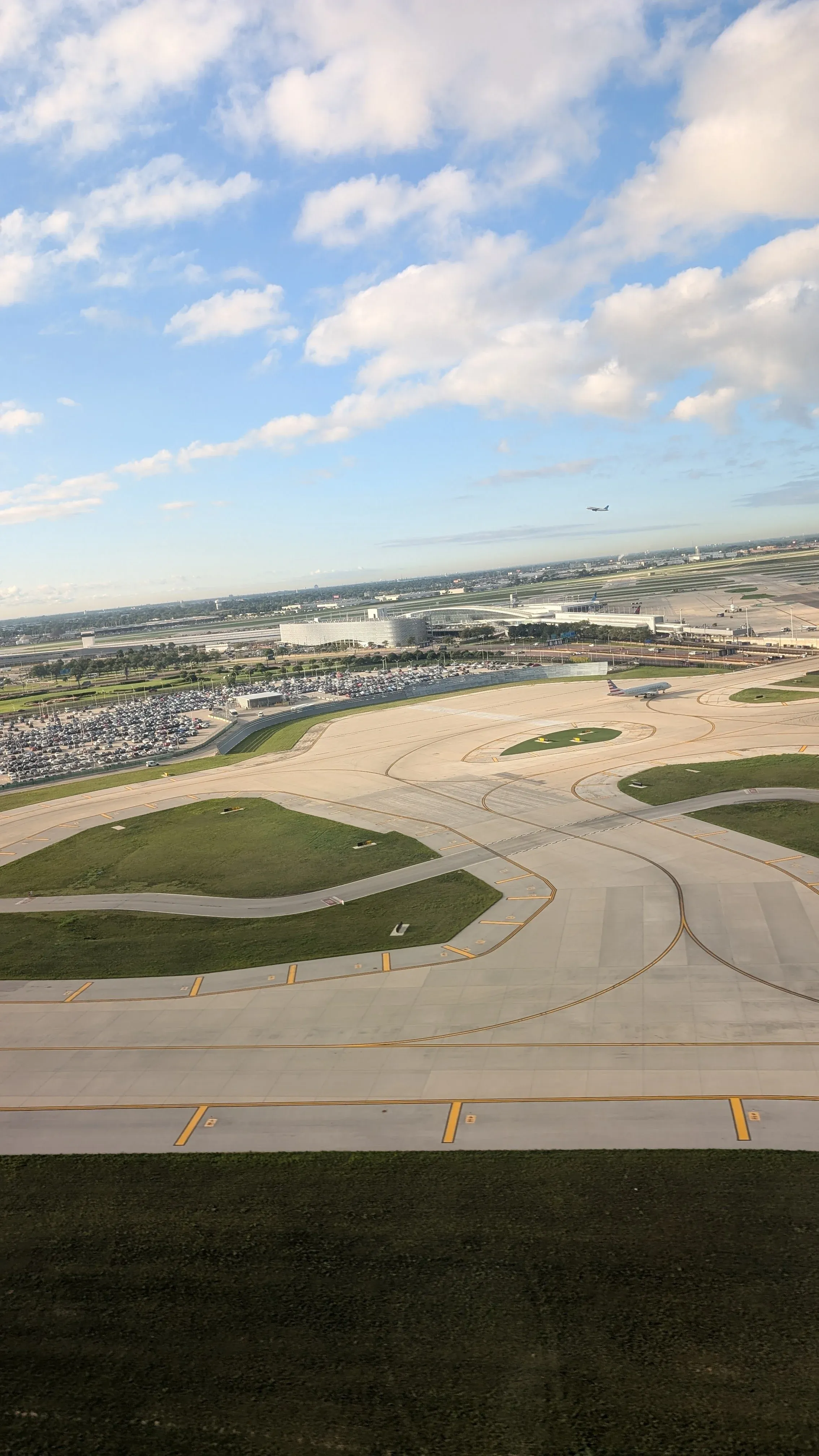 An airfield seen from the air on the way home.